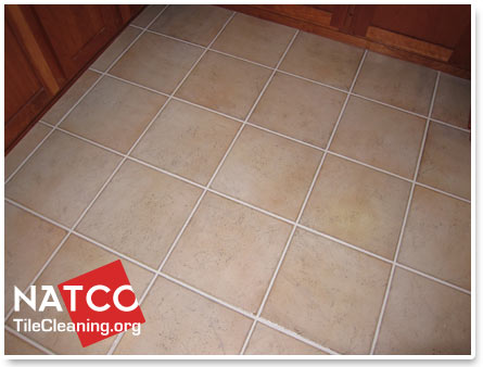 tile floor with white painted grout